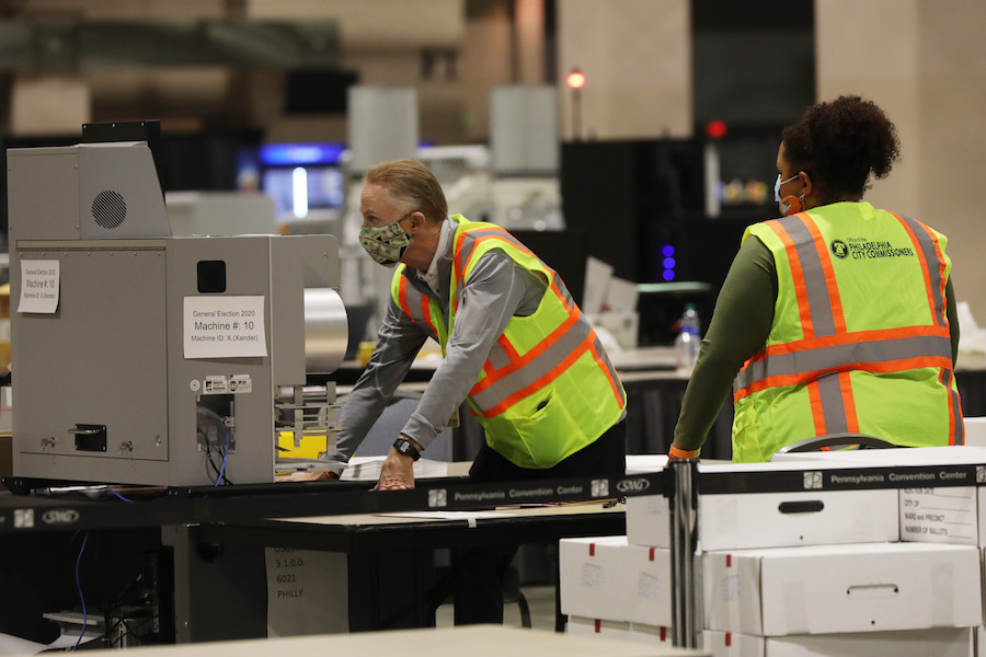 workers count the Philadelphia vote inside the Pennsylvania Convention Center, which will play a big part in the Pennsylvania election results