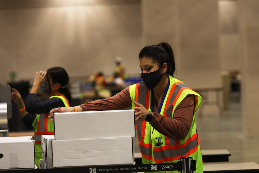 workers count the Philadelphia vote inside the Pennsylvania Convention Center, which will play a big part in the Pennsylvania election results