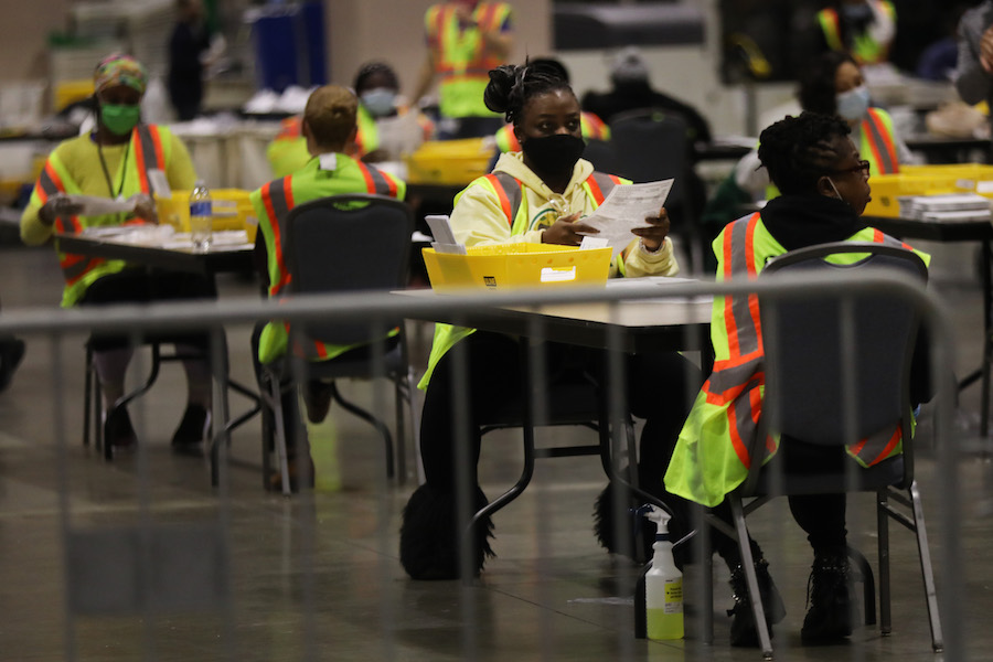 workers count the Philadelphia vote inside the Pennsylvania Convention Center, which will play a big part in the Pennsylvania election results