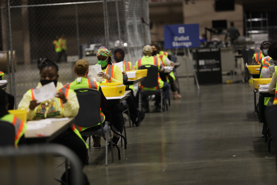 workers count the Philadelphia vote inside the Pennsylvania Convention Center, which will play a big part in the Pennsylvania election results