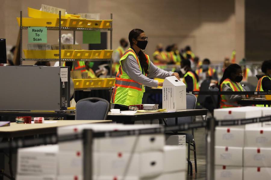 workers count the Philadelphia vote inside the Pennsylvania Convention Center, which will play a big part in the Pennsylvania election results