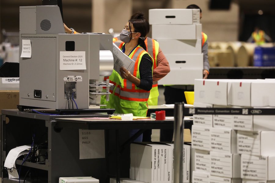 workers count the Philadelphia vote inside the Pennsylvania Convention Center, which will play a big part in the Pennsylvania election results