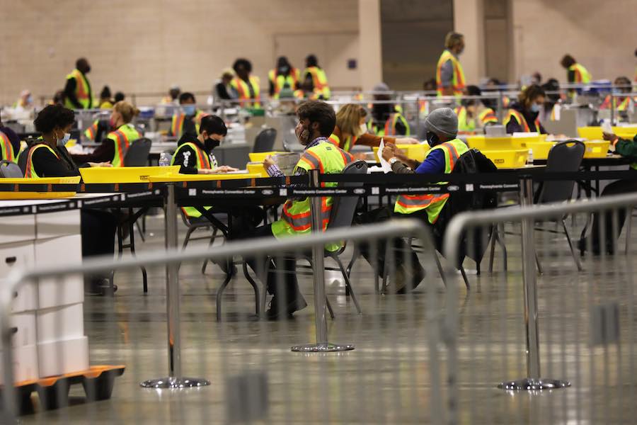 workers count the Philadelphia vote inside the Pennsylvania Convention Center, which will play a big part in the Pennsylvania election results