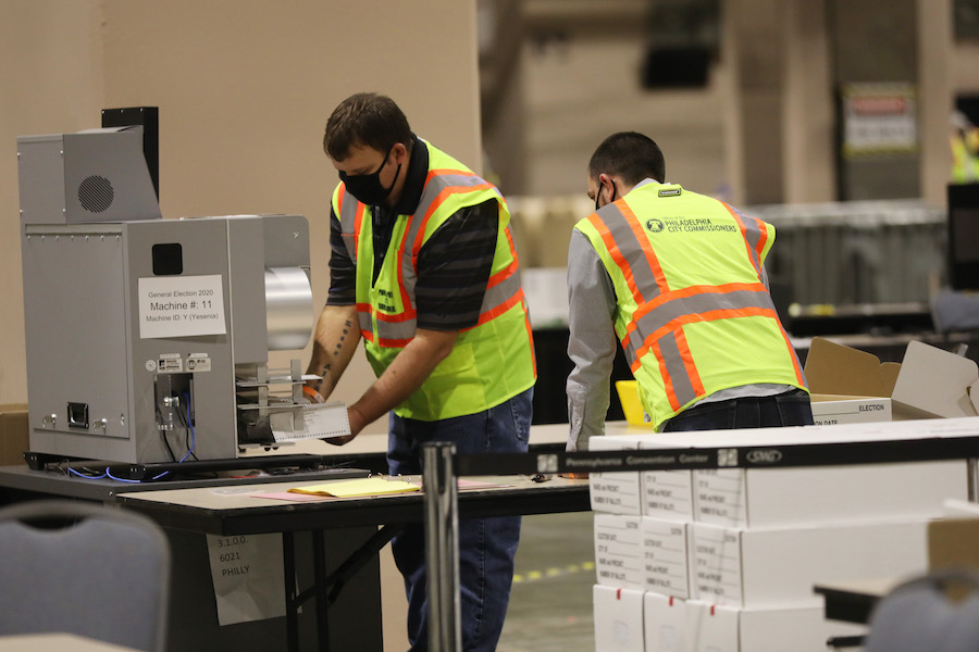 workers count the Philadelphia vote inside the Pennsylvania Convention Center, which will play a big part in the Pennsylvania election results