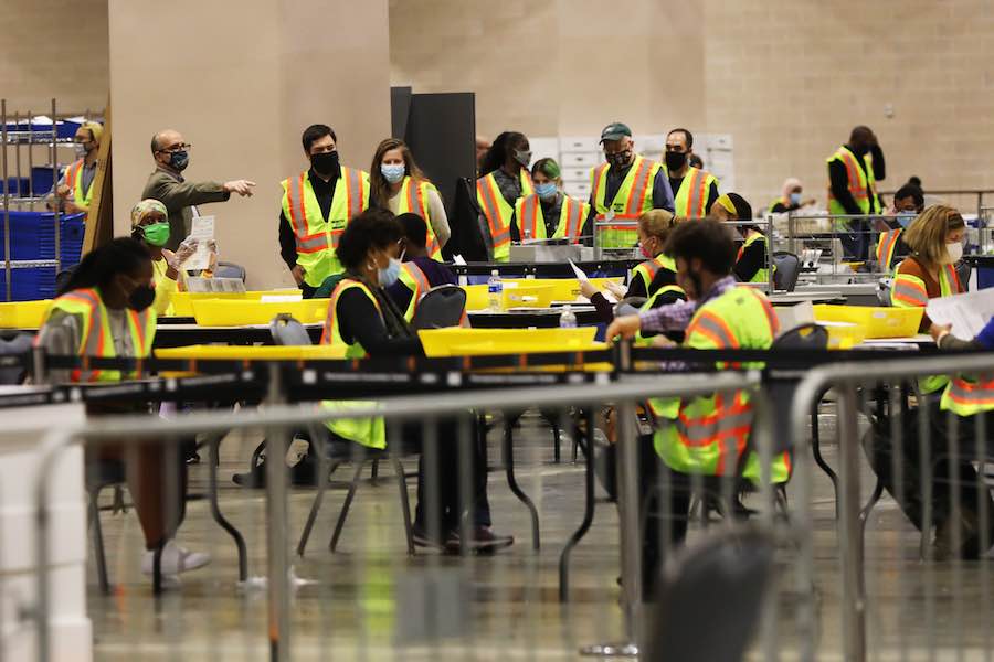 workers count the Philadelphia vote inside the Pennsylvania Convention Center, which will play a big part in the Pennsylvania election results