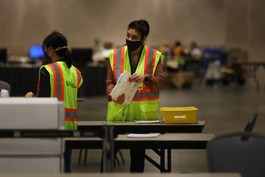 workers count the Philadelphia vote inside the Pennsylvania Convention Center, which will play a big part in the Pennsylvania election results