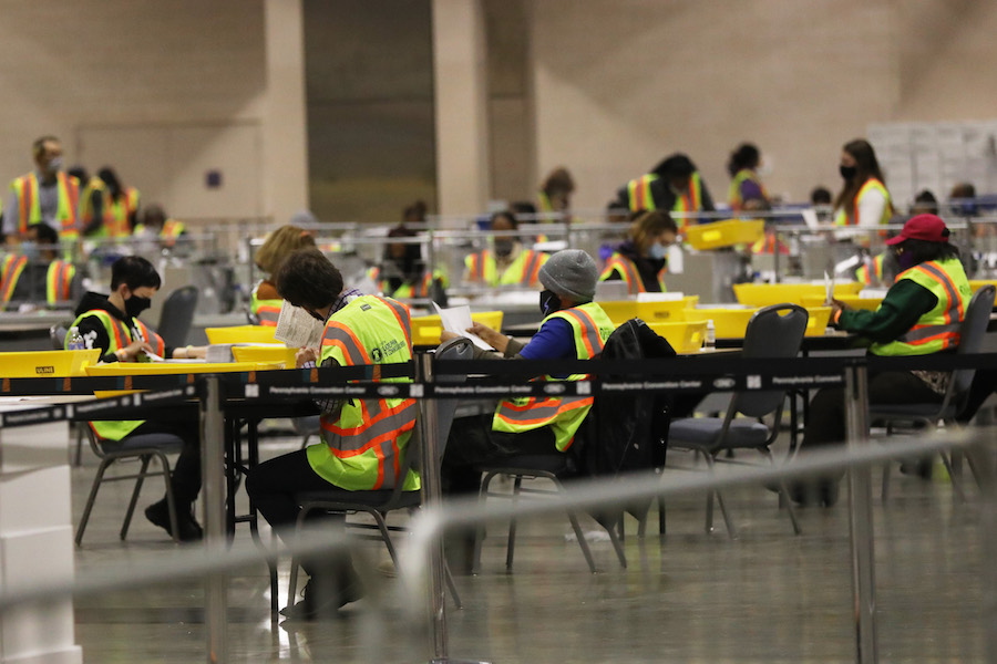 workers count the Philadelphia vote inside the Pennsylvania Convention Center, which will play a big part in the Pennsylvania election results