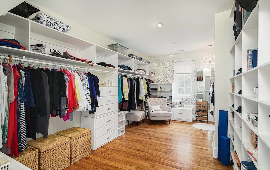 primary bedroom closet and dressing room