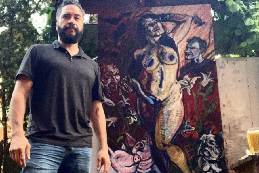 raphael tiberino and his painting, which was stolen from his west philadelphia home on Sunday