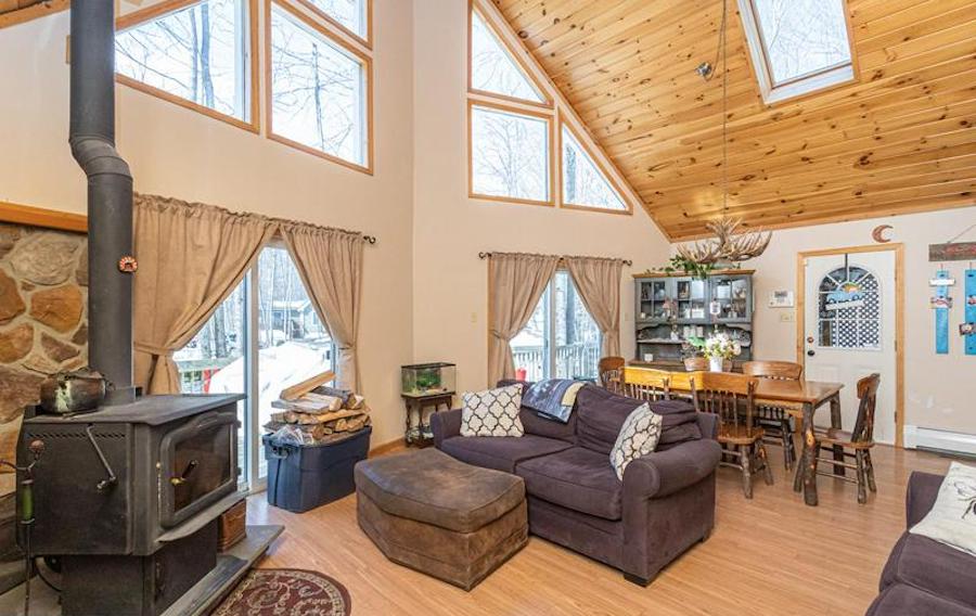 house for sale Pocono lake contemporary chalet main living area