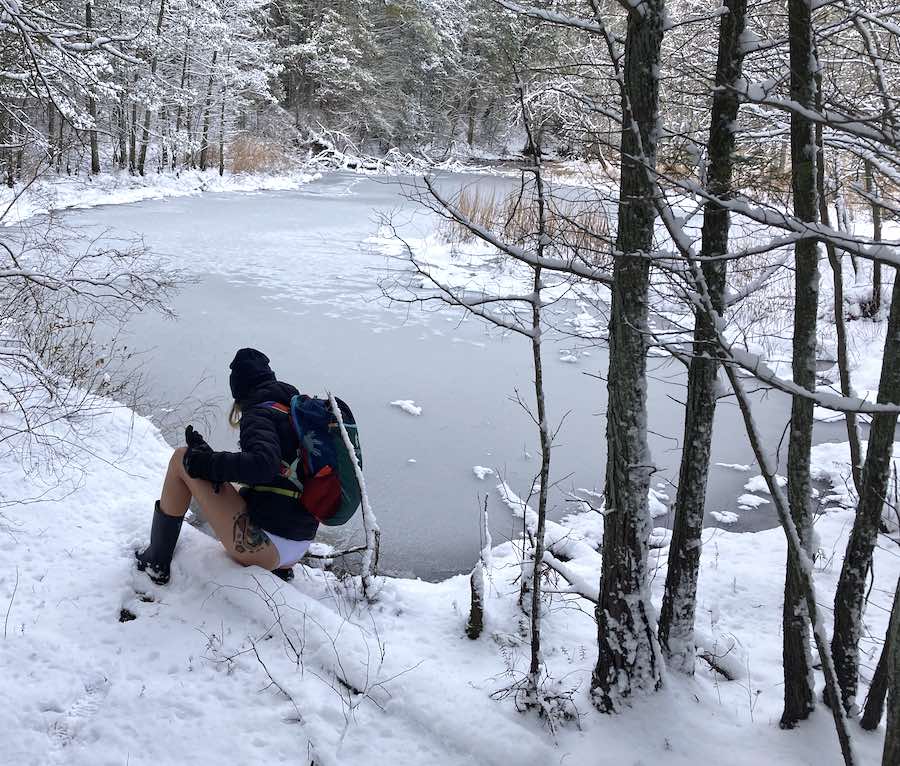 Rachel Oliver, one of the Icewomen of South Jersey, checks ice thickness in Batsto