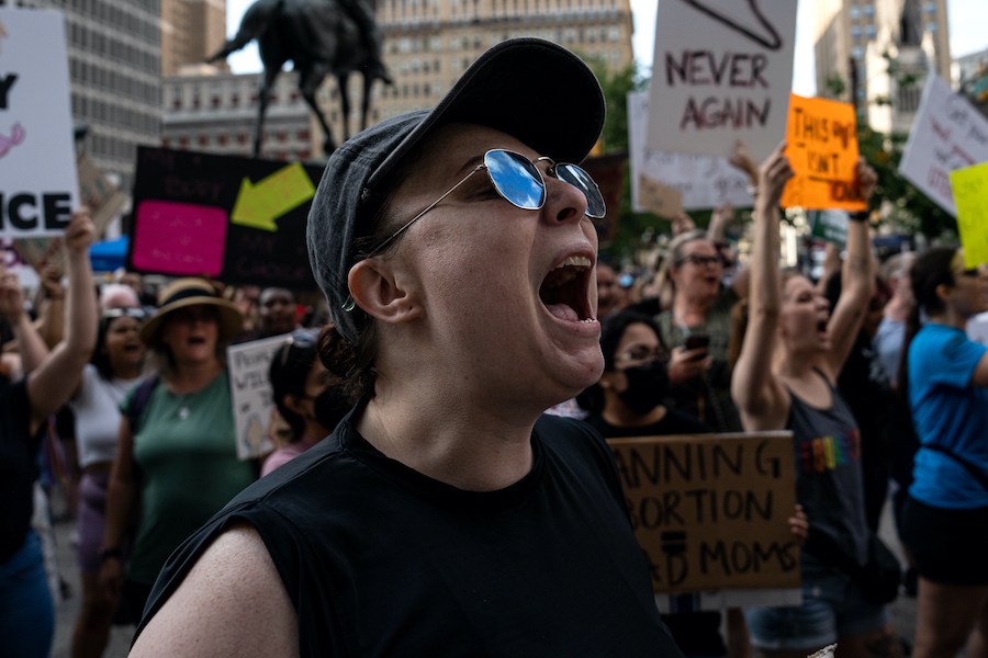a protester in philadelphia in the wake of the Supreme Court's decision to overturn abortion laws in the united states