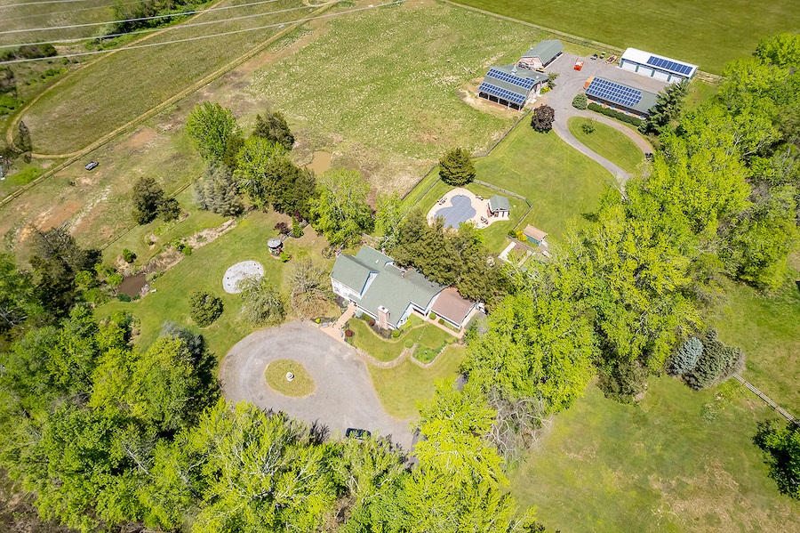 aerial view of homestead and farm buildings