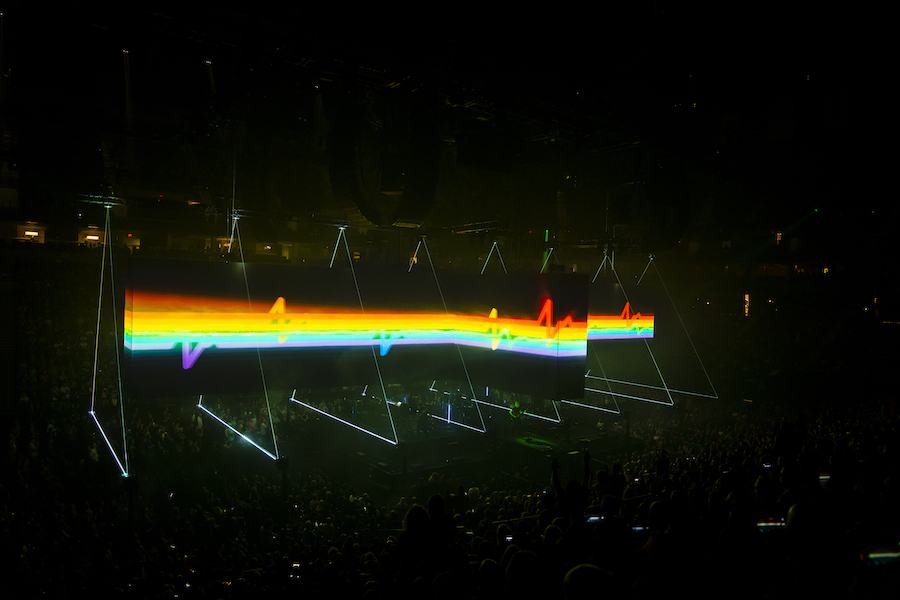 Numerous lasers and video screens combine forces at a Roger Waters 2022 performance