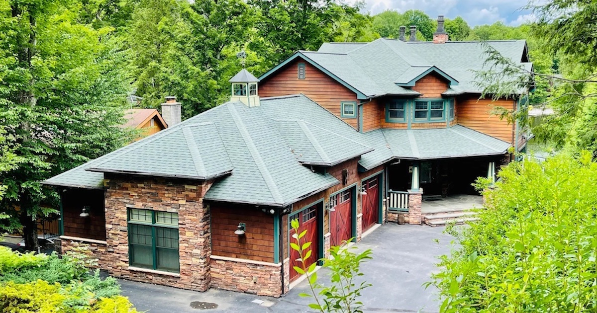 In the Poconos Roamingwood Lake Lakeside House for Sale