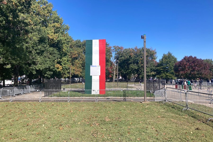 a photo of South Philadelphia's Christopher Columbus statue box, which got an Italian flag paint job in honor of Columbus Day