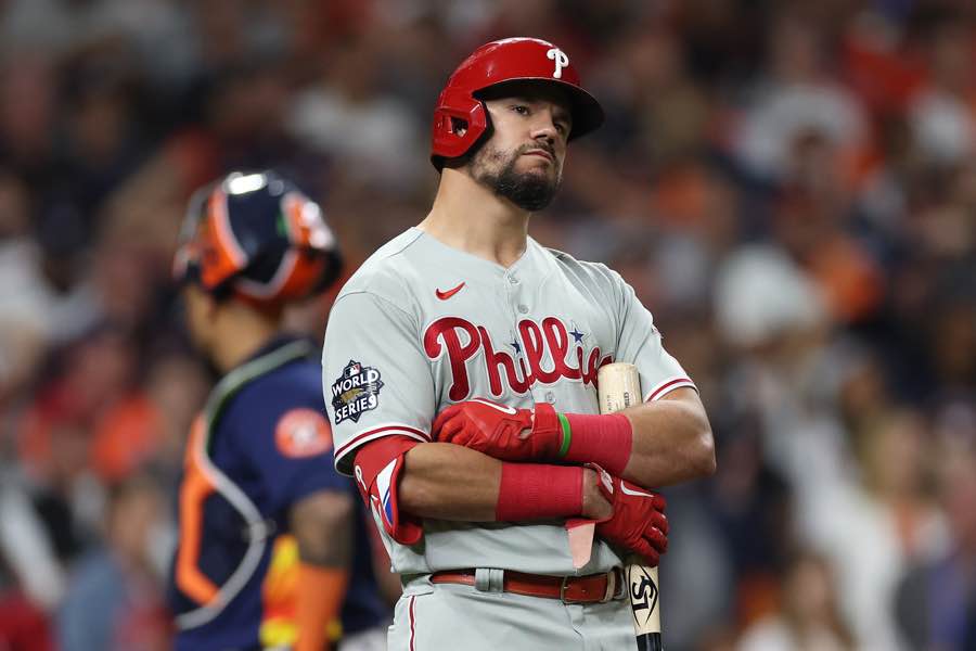 Kyle Schwarber watches a replay of hit eighth inning foul ball