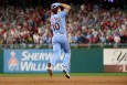 J.T. Realmuto reacts with his hands on his head to Chas McCormick catching his fly ball against the outfield wall.