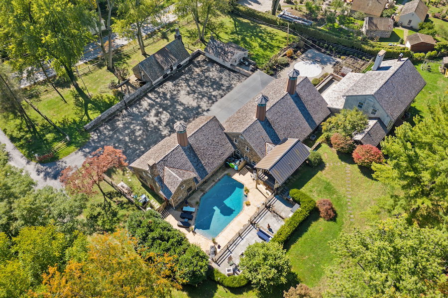 aerial view of pool and backyard