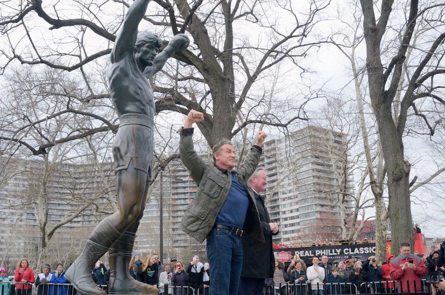 Sylvester Stallone stands next to the Rocky statue with Jim Kenney in 2018