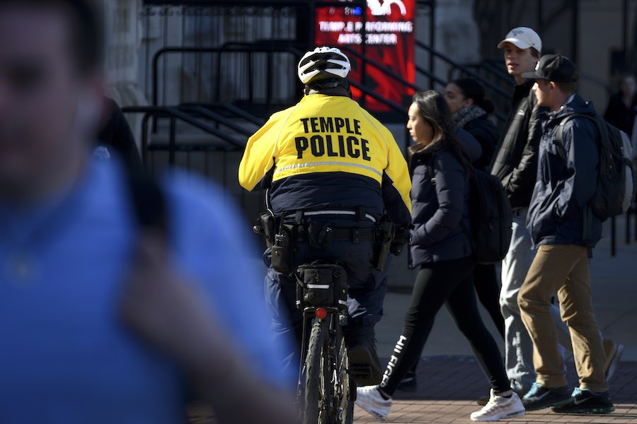 a temple university police officer looks out for crime on the temple campus