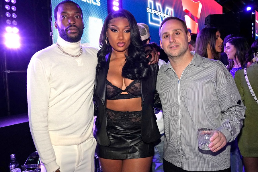 a photo of meek mill and Megan Thee Stallion with former Sixers owner and current Fanatics CEO Michael Rubin, who is divesting in NFTs