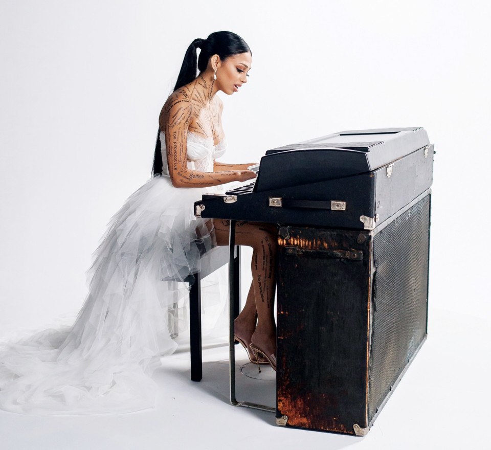 M. Night Shyamalan's daughter Saleka Shyamalan at an electric piano