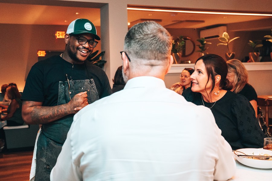 Elijah Milligan greeting guests at his Delco restaurant Rosemary in Ridley Park 