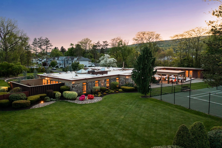 aerial view of house and backyard