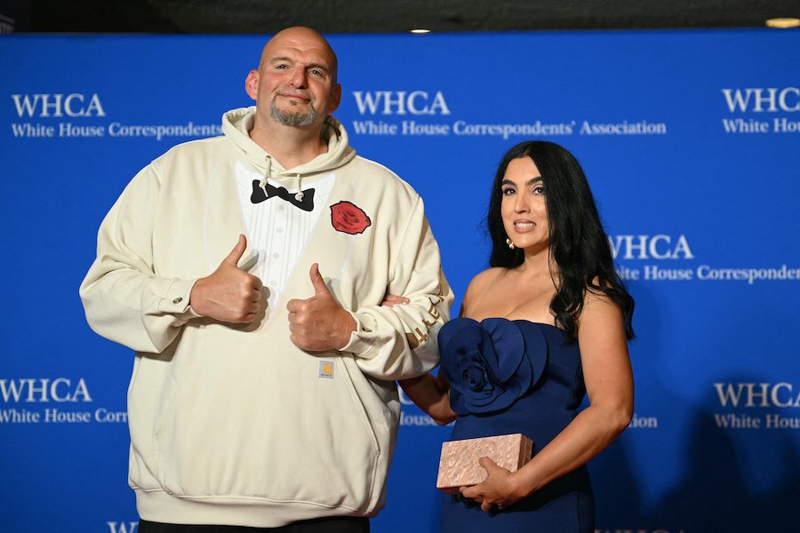 US Senator John Fetterman (L) and his wife Gisele Barreto Fetterman arrive for the White House Correspondents' Association (WHCA) dinner at the Washington Hilton, in Washington, DC, on April 27, 2024. (Photo by Drew ANGERER / AFP)