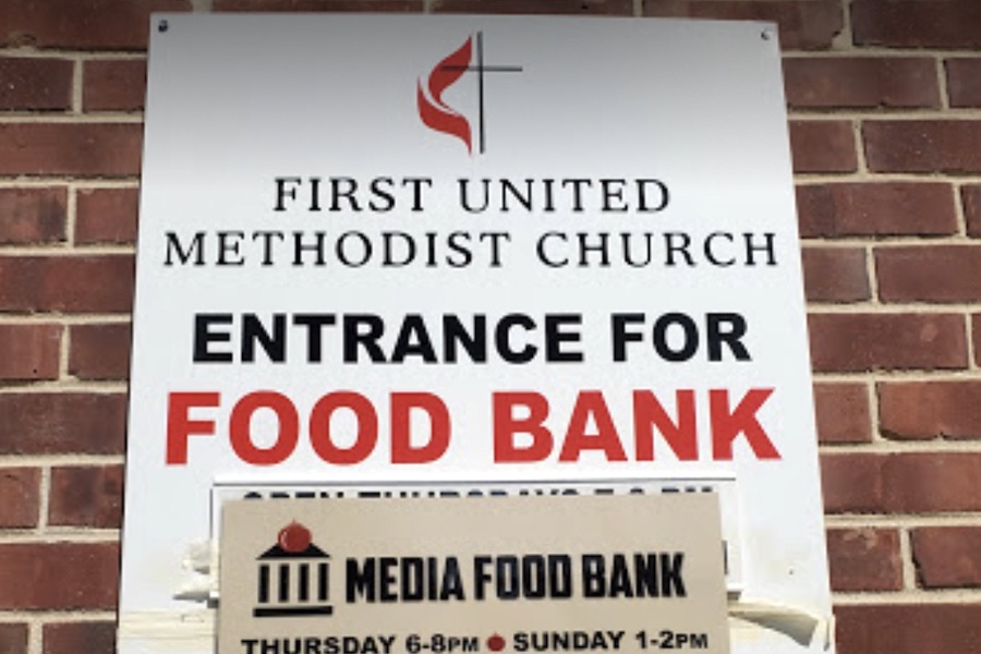 A sign for Media Food Bank at First United Methodist Church, where a lawsuit has erupted over another food bank.