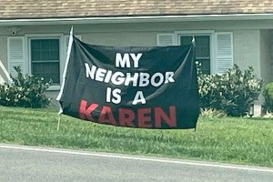 The parents of the 11-year-old Havertown biker known as Oneway Lilman recently put up this "My Neighbor Is a Karen" sign on their Delco lawn. (photo via Facebook)