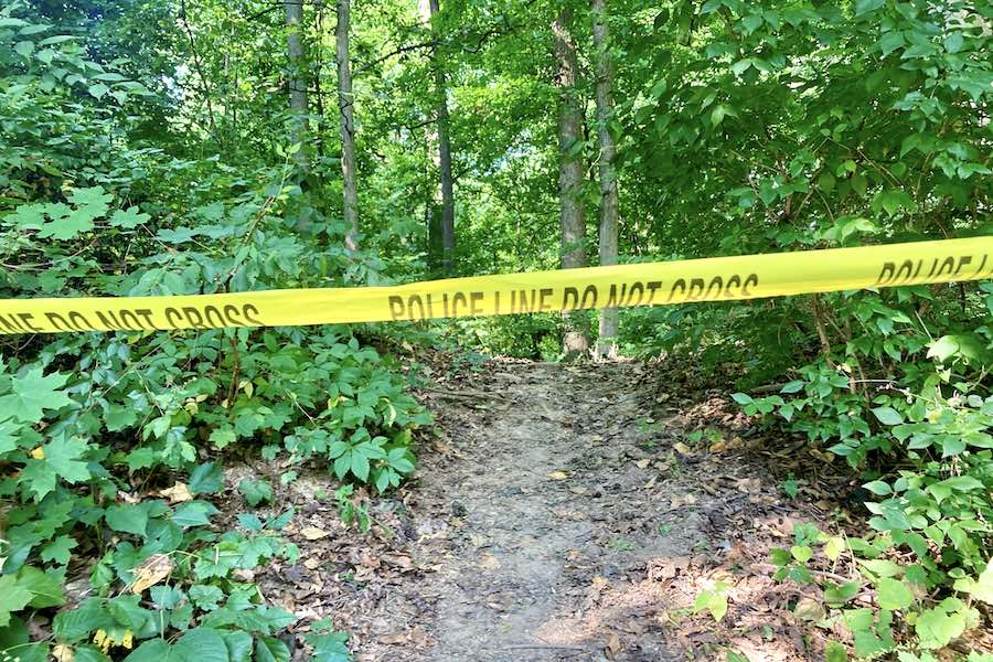 An entrance to Morris Park in West Philadelphia, where a body was found hanging from a tree on Sunday morning