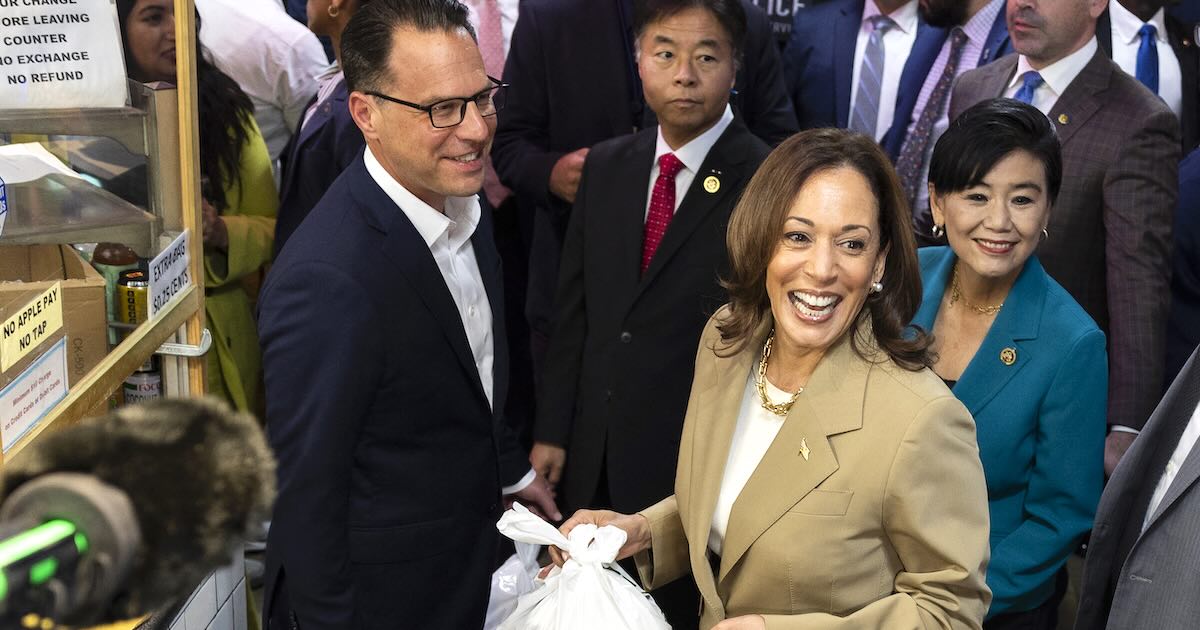 Josh Shapiro and Kamala Harris at Reading Terminal Market in 2024. Harris just shared her thoughts about Shapiro in her new book, 107 Days.