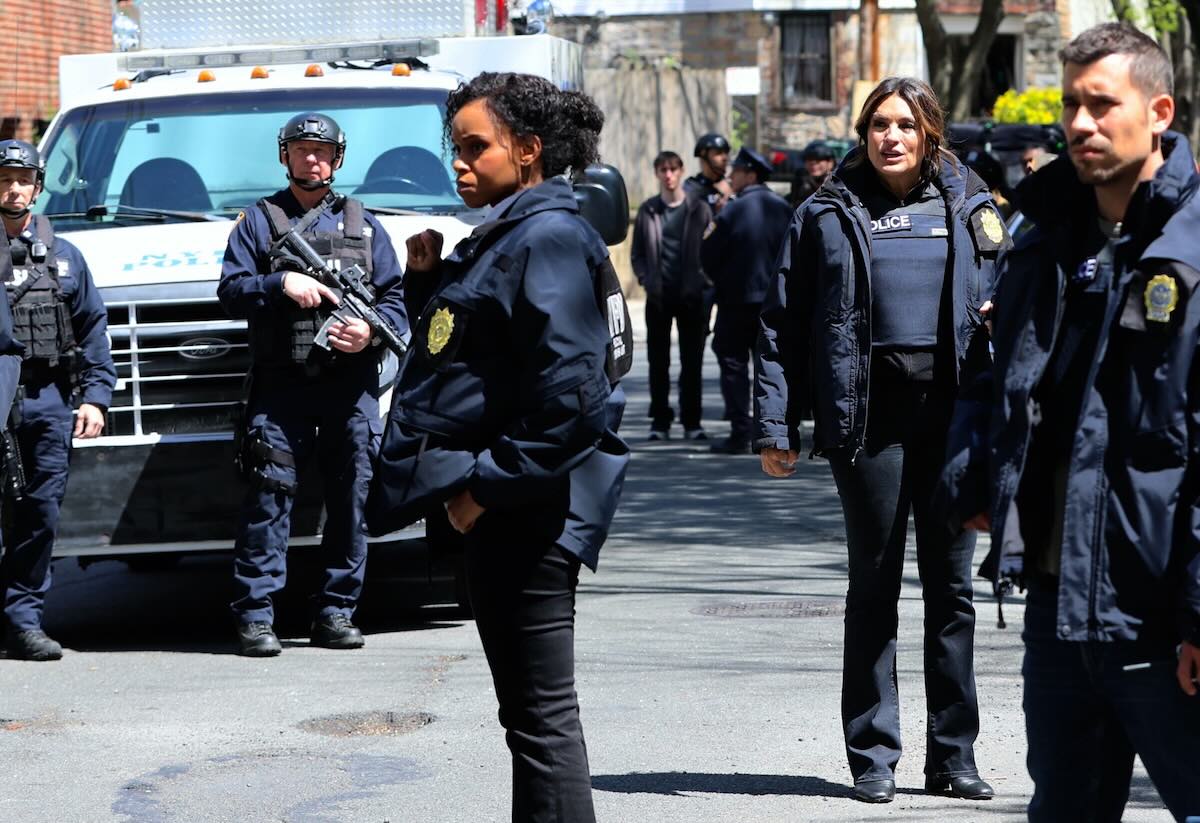 Aimé Donna Kelly and other cast members on the streets of New York during a <em>Law & Order: SVU</em> shoot in 2024.