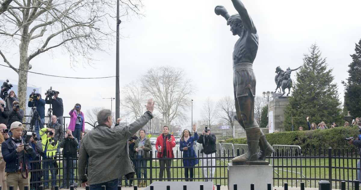 Sylvester Stallone with the original Rocky statue, which he has decided to let the city keep 