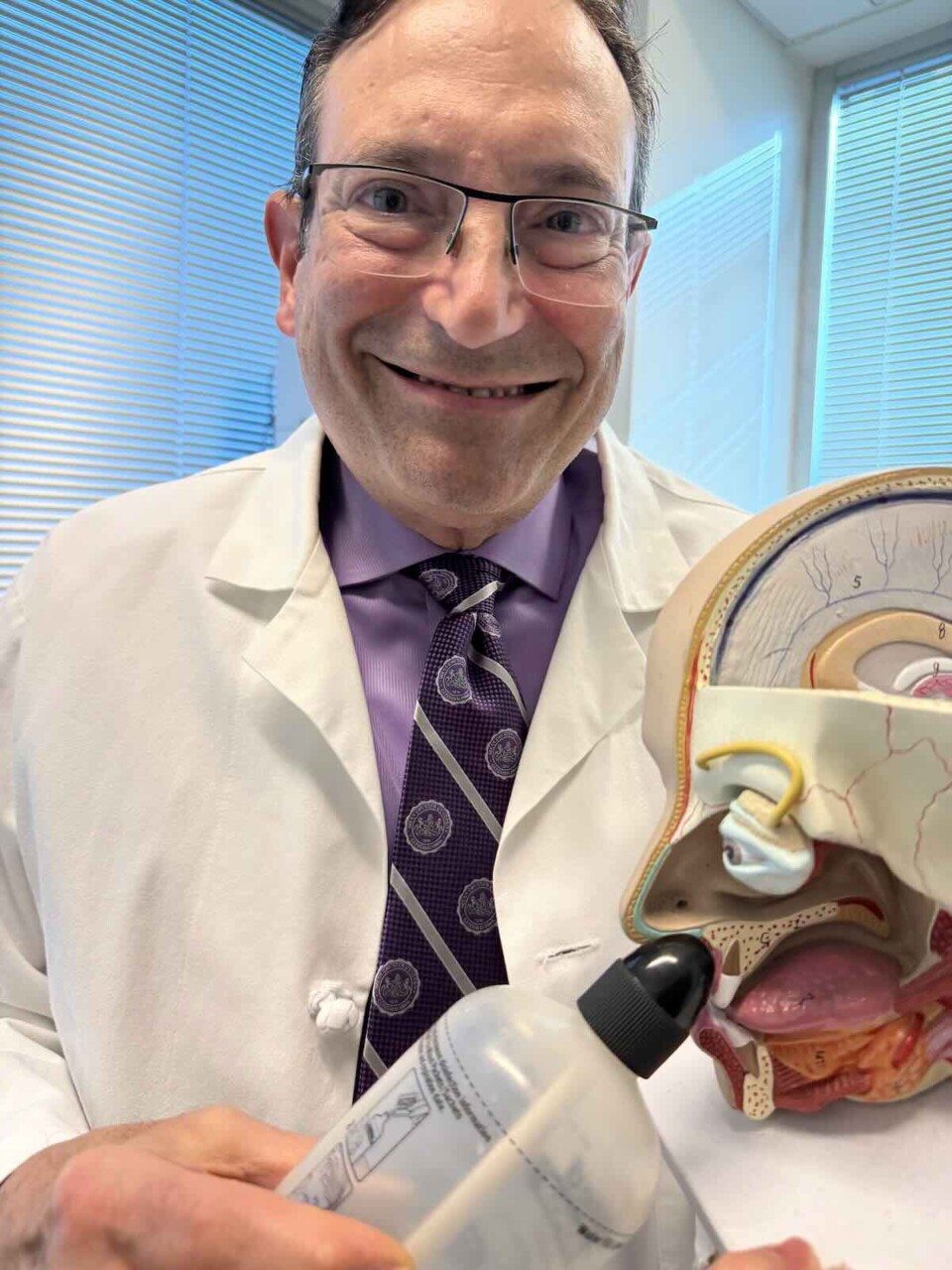 Dr. Mike demonstrates nasal lavage, which can be helpful in treating seasonal allergies