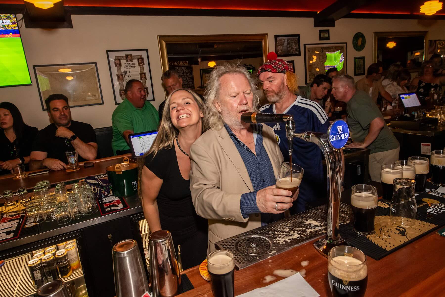 Fergus "Fergie" Carey pours a Guinness on opening night at the Monto (<a href="https://www.instagram.com/lisaschafferphotography/?hl=en" target="_blank" rel="noopener">Lisa Schaffer Photography</a>)