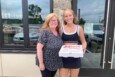 Mother and daughter Pica's pizza fans grabbing an afternoon snack at the new Pica's Broomall location on Tuesday