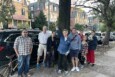 Beth Duddy and concerned neighbors in front of the West Philadelphia tree threatened with removal